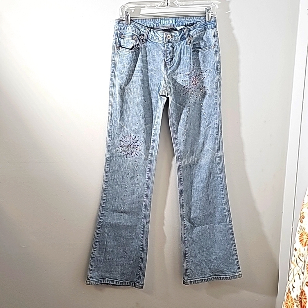 Zanadi, women's vintage bell‎ bottom jeans with pink/purple bling. Size 9.